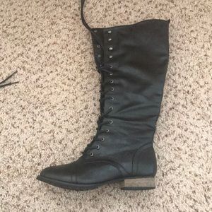Knee high black lace up boots